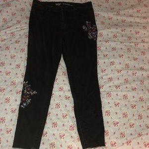 Black embroidered mid rise skinny jeans